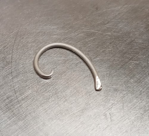 Judy Larson's Split Bead Earrings - , Contemporary Wire Jewelry, Filing, Finishing, , sanding, filing, polishing, trim the wire shorter, and hammering the end to make it curl